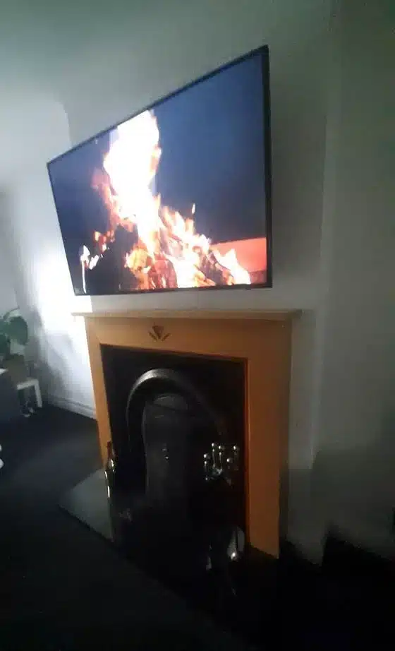 55-inch TV over fireplace – Tullamore, Co. Offaly 55-inch TV wall mounted above a fireplace with hidden cables in Tullamore, Co. Offaly